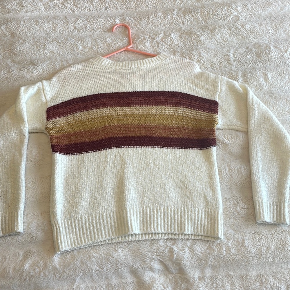Cream knit sweater with rust and orange detailing